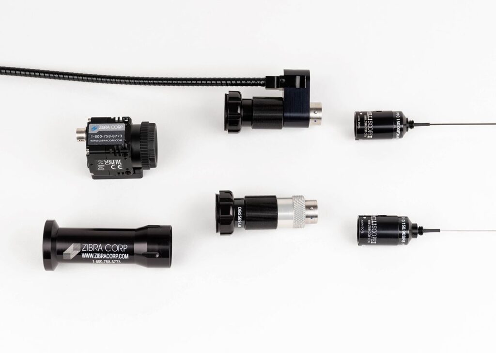 Black objects on white background with 'Milliscope II system' text
