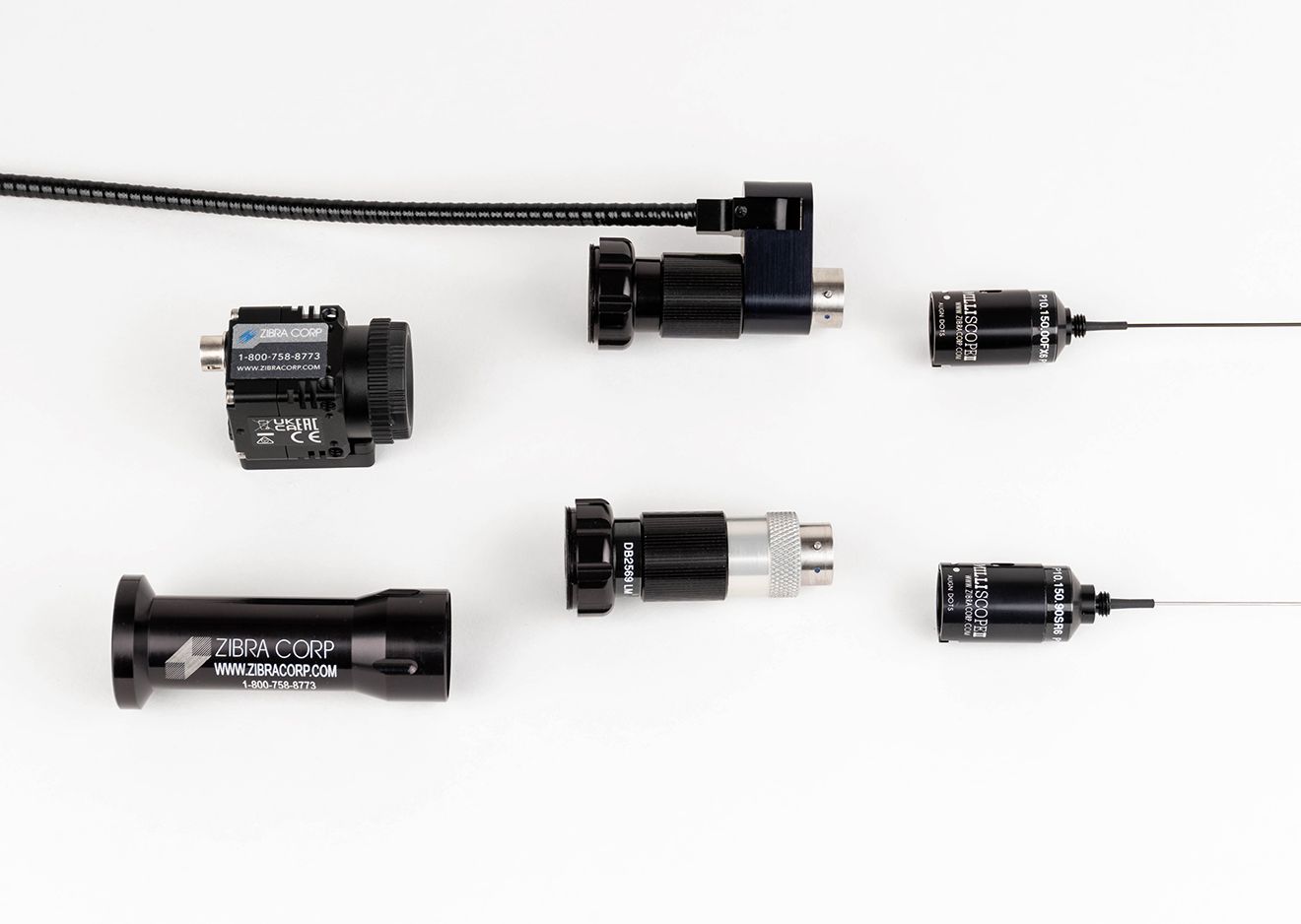 Black objects on white background with 'Milliscope II system' text