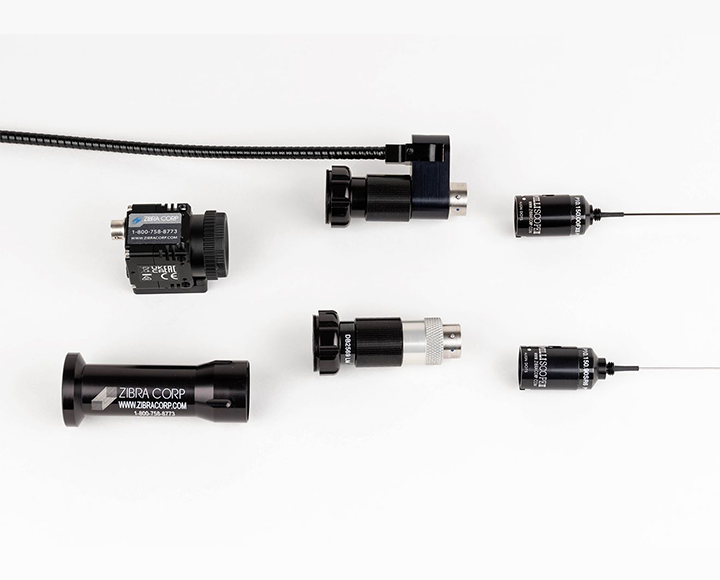 Black objects on white background with 'Milliscope II system' text