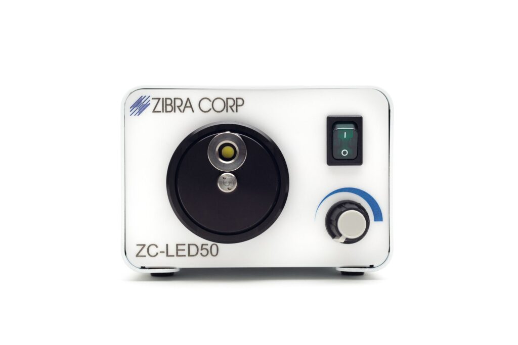 A zibra corp zc-led-50 device is sitting on a white surface