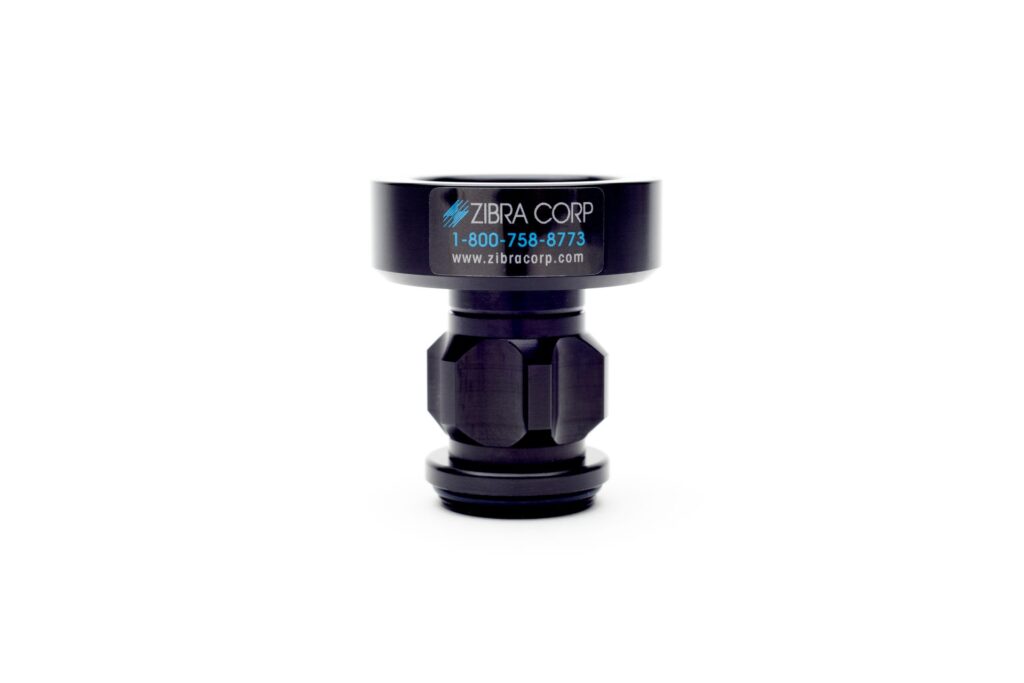 A close up of a black object that says zibra out on it
