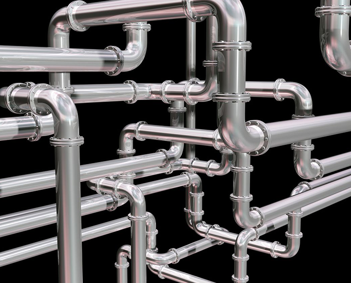 Silver pipes intertwined on a black background