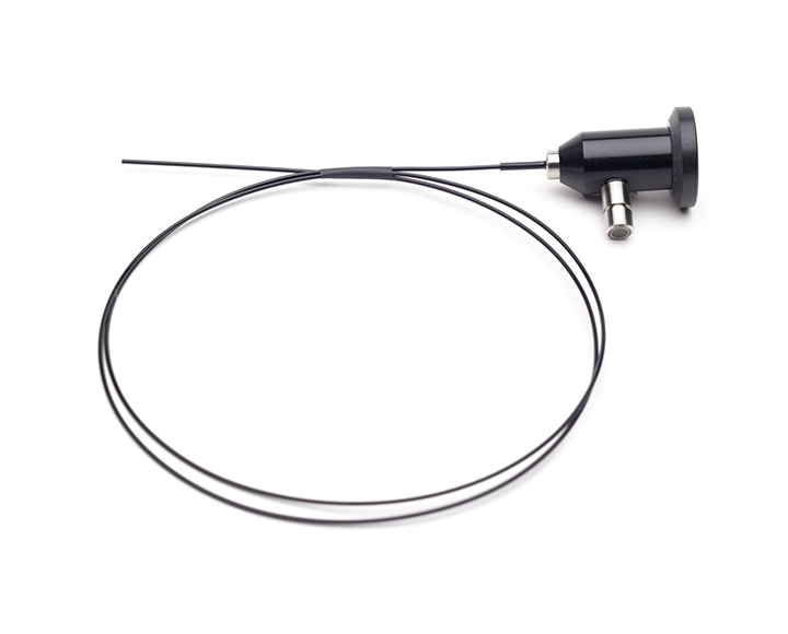 A black scope with a cable attached to it on a white background.