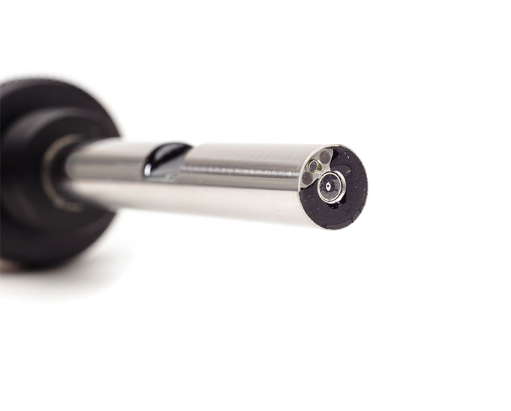 A close up of a multiscope on a white background.