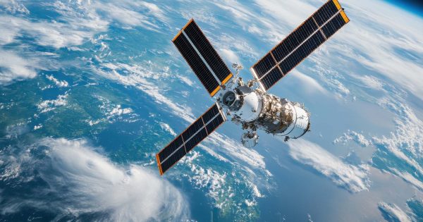 satellite orbiting the earth with the earth in the background